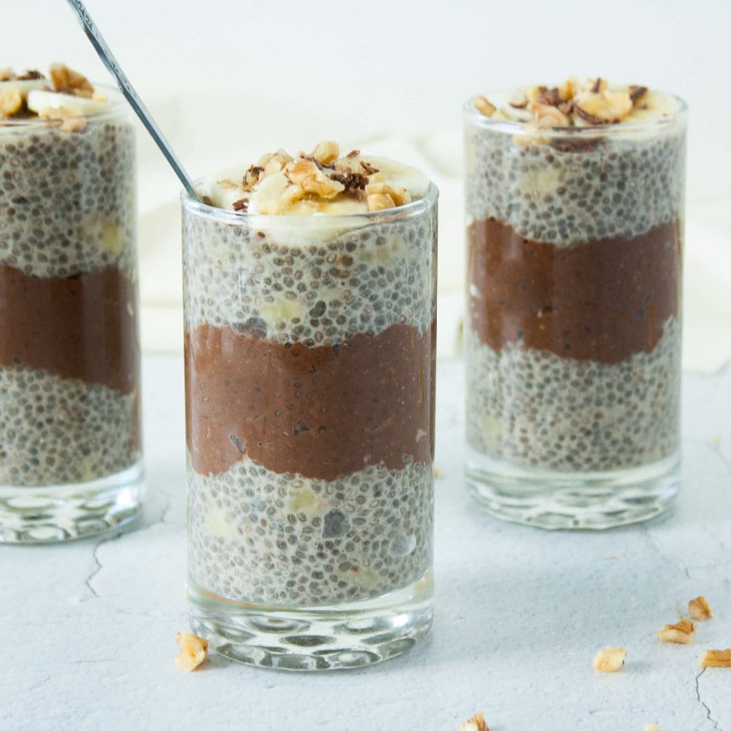 Cups of layered chocolate banana chia seed pudding