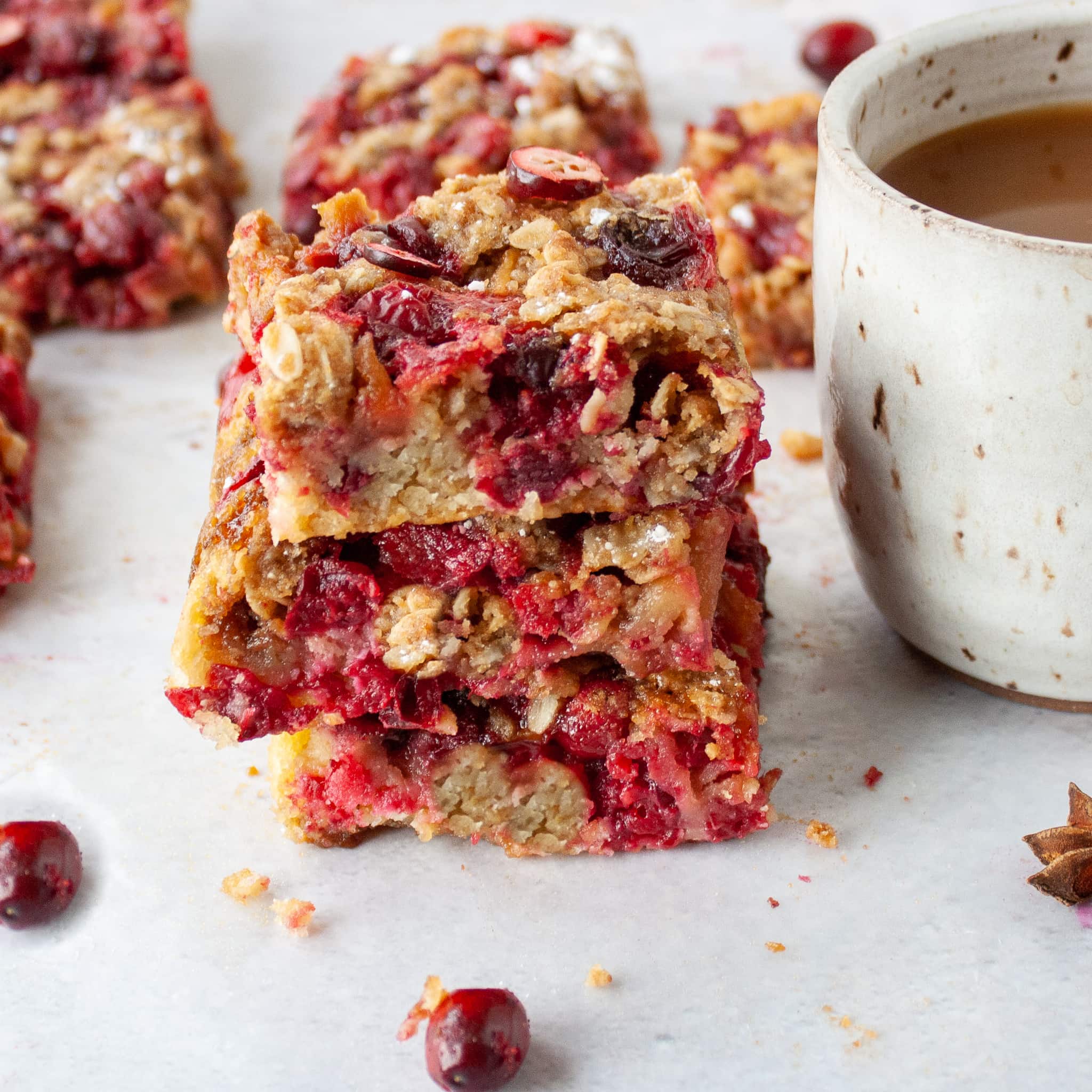 Stack of cranberry crumble bars