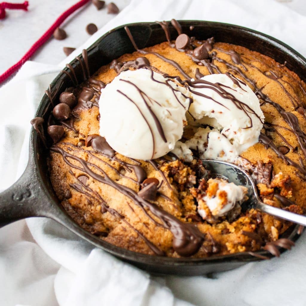 Photo of a mini cookie skillet for two with a scoop of ice cream