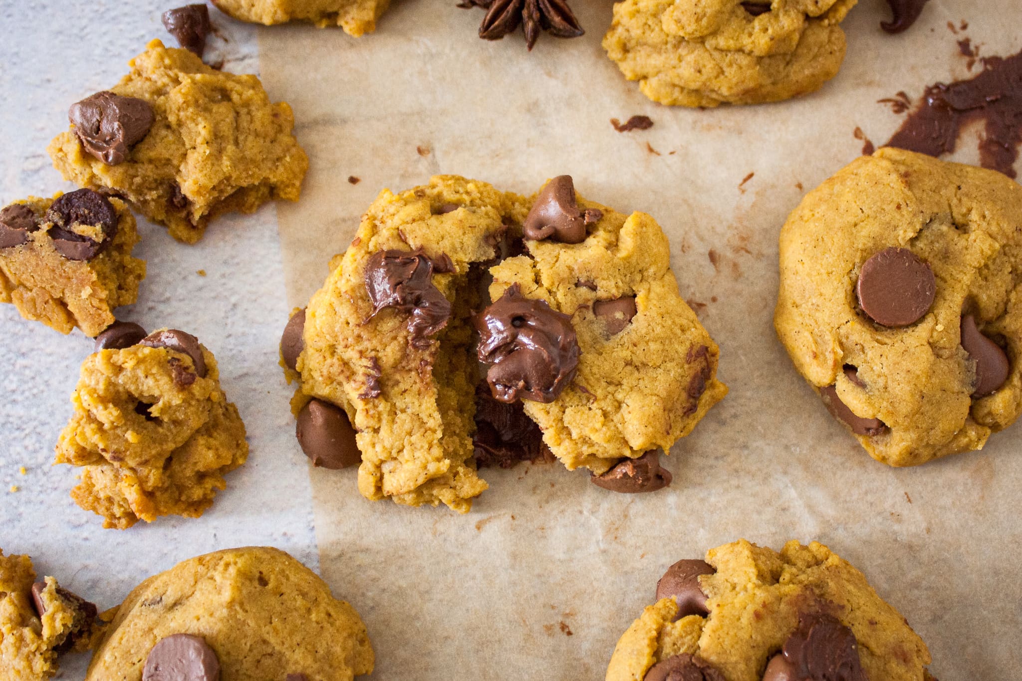 Close up photo of a pumpkin chocolate chip cookie